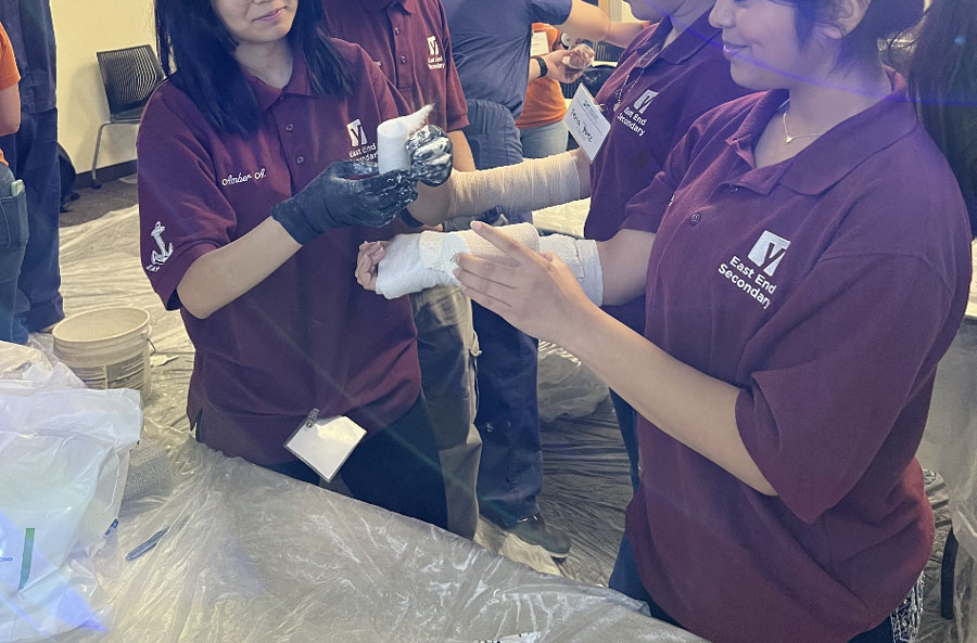 students practicing casting at Health Careers Collaborative finale at McGovern Medical School