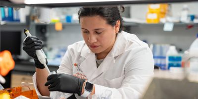 researcher holding equipment